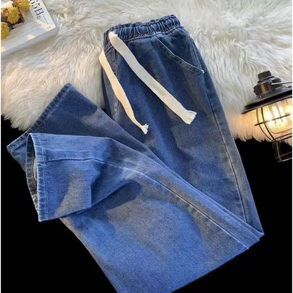 Designer men's jeans new unisex loose pants spring/summer buttonless design jeans
