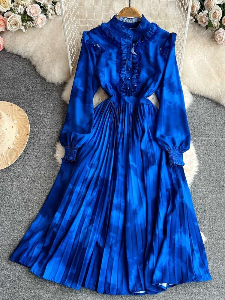 High End Lantern Long Sleeved Stand Up Collar with Ruffled Edges That Wrap Around the Waist for A Slimming Effect. A-line Halo Dye Printed Pleated Dre