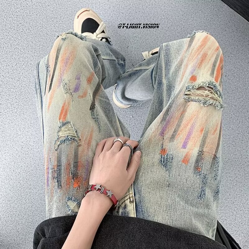 Graffiti distressed jeans for men with summer design sense, niche zippered pants, high street vibe American hip-hop straight leg pants