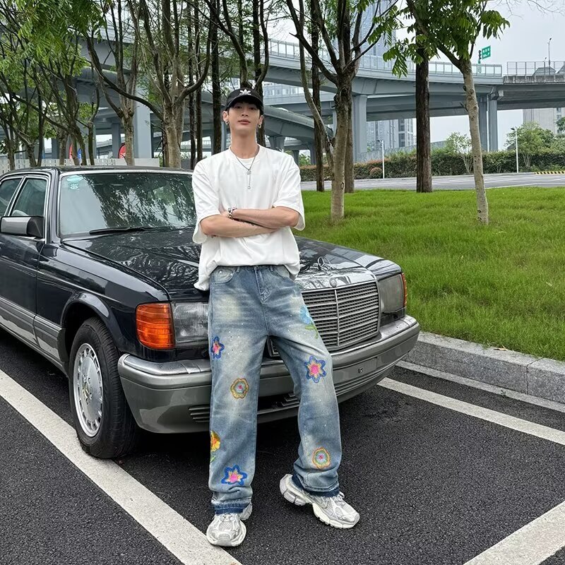 Uniquely designed petal embroidered denim jeans for men, trendy brand street edge with loose and versatile legs, casual pants