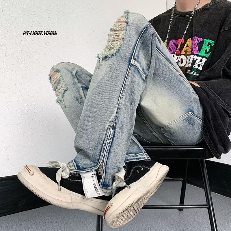Graffiti distressed jeans for men with summer design sense, niche zippered pants, high street vibe American hip-hop straight leg pants