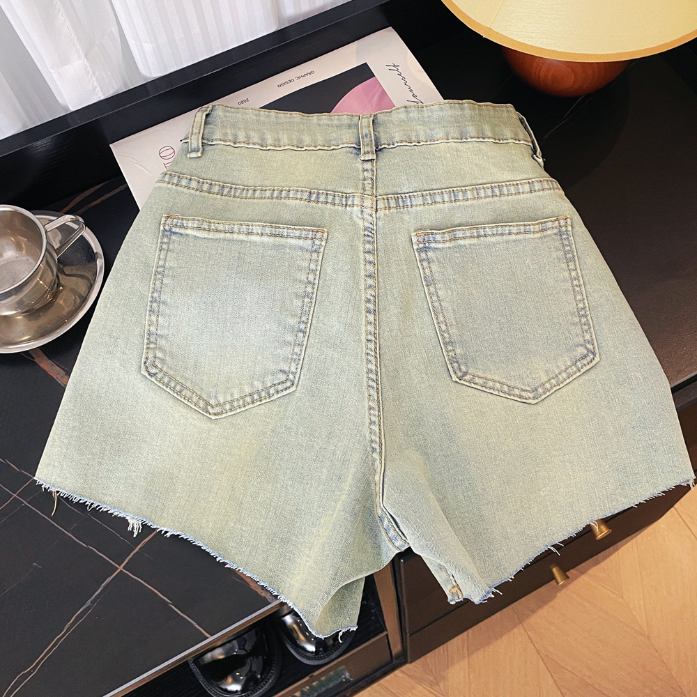 Korean style design with contrasting colors, embroidered flowers, elastic slit, high waist, straight tube, slimming effect, fringed denim shorts, wome