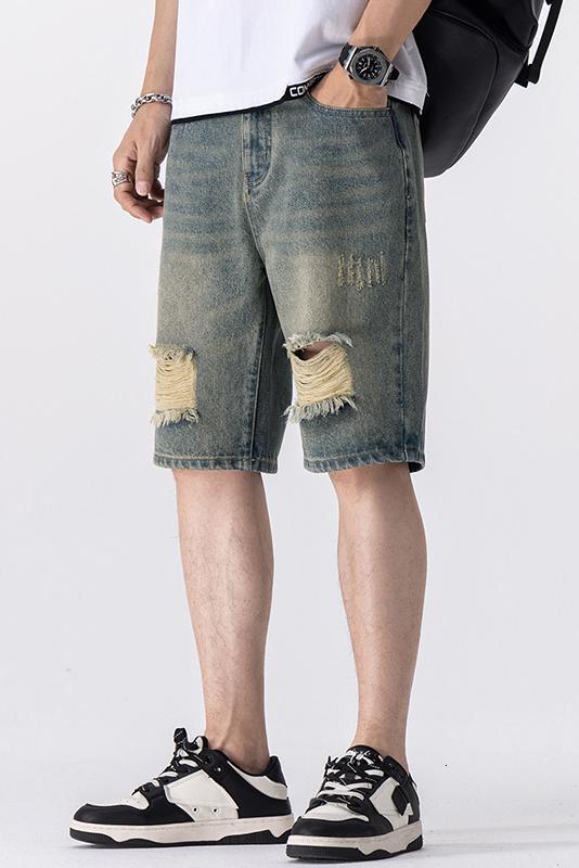 Summer brand fashion trend young ripped denim five quarter men's shorts