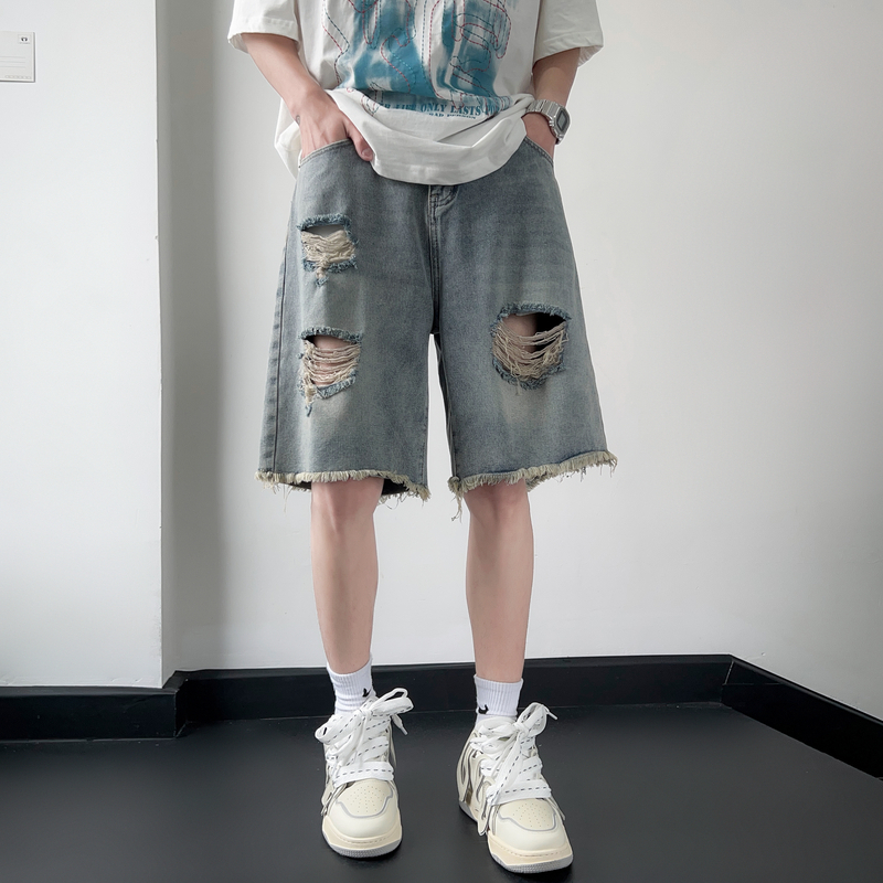 Ripped denim shorts with rough edges, men's summer trendy casual five quarter pants, washed wide leg mid length pants