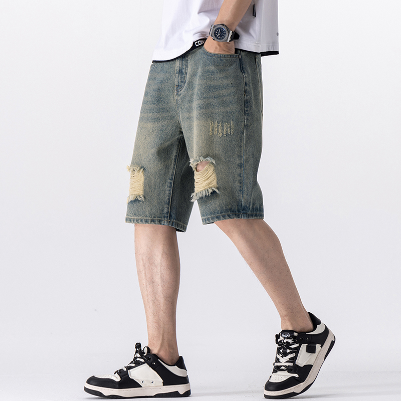 Summer brand fashion trend young ripped denim five quarter men's shorts