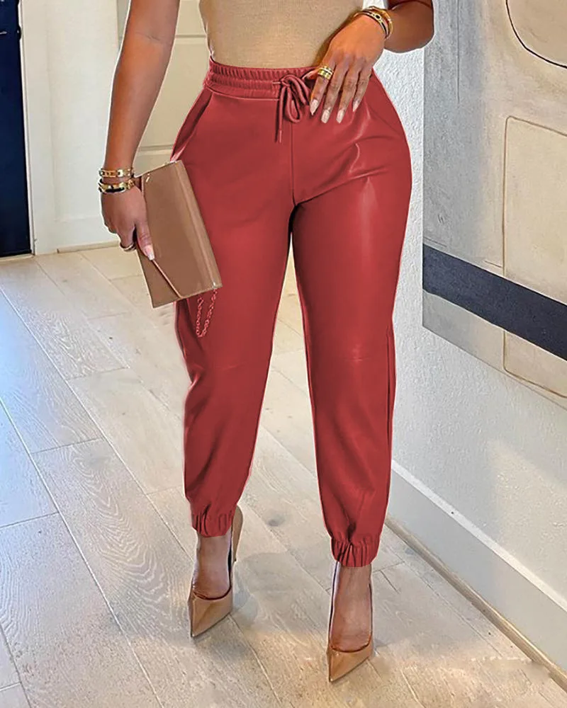 Spring and summer in Europe and the solid color draw string bag PU leather bunch of foot skin height pants female leisure fa