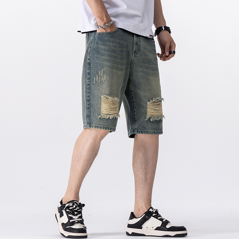 Summer brand fashion trend young ripped denim five quarter men's shorts