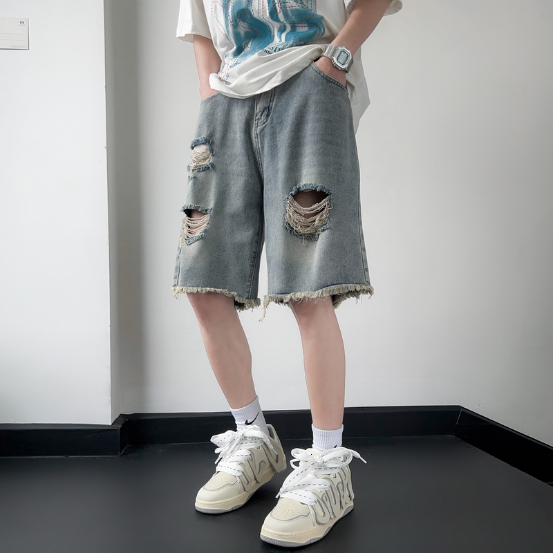 Ripped denim shorts with rough edges, men's summer trendy casual five quarter pants, washed wide leg mid length pants