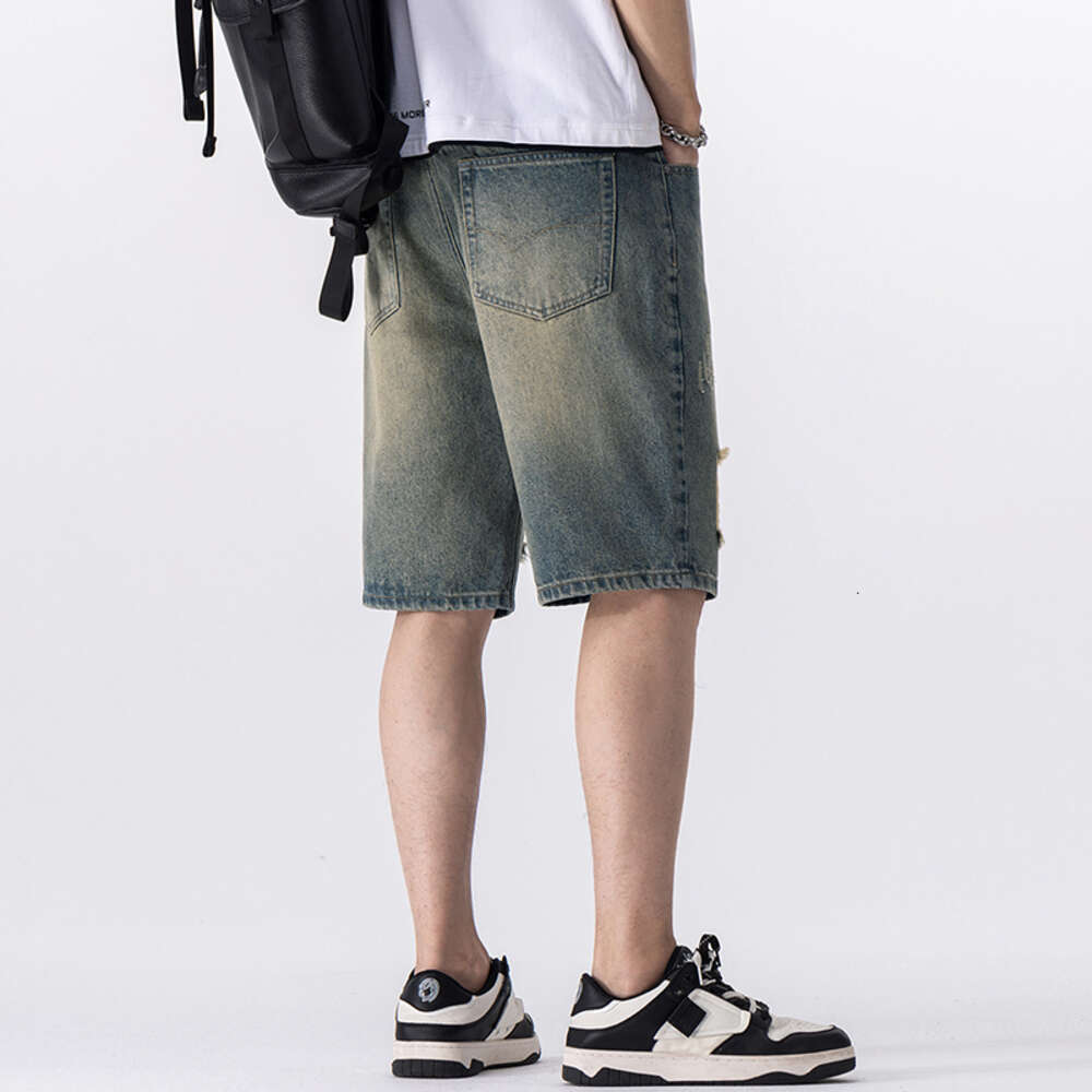 Summer brand fashion trend young ripped denim five quarter men's shorts