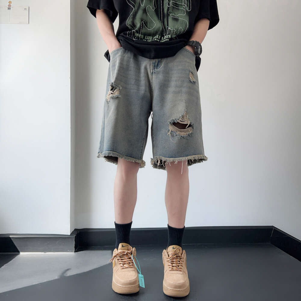 Ripped denim shorts for men, thin, loose, fringed casual pants, American high street five quarter pants