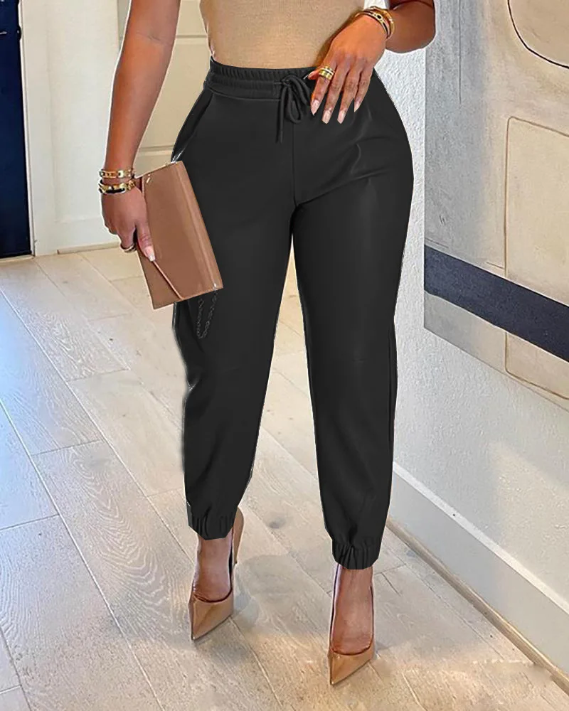 Spring and summer in Europe and the solid color draw string bag PU leather bunch of foot skin height pants female leisure fa