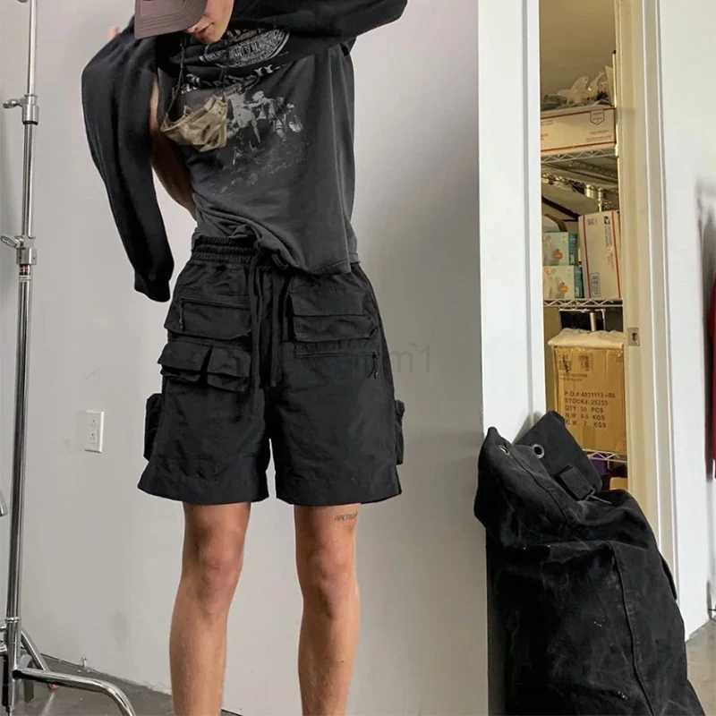 Trendy Mens Mutli Pockets Cargo Shorts Summer Vintage Drawstring Tie-up Loose Shorts Y2K Fashion Men Solid Color Straight Shorts M240720