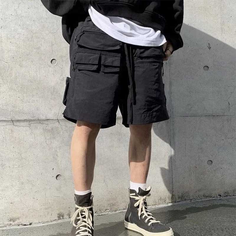 Trendy Mens Mutli Pockets Cargo Shorts Summer Vintage Drawstring Tie-up Loose Shorts Y2K Fashion Men Solid Color Straight Shorts M240720