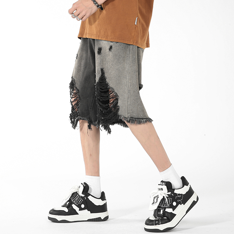 Ripped denim shorts men's summer thin cut fringed loose five quarter American high street horse pants
