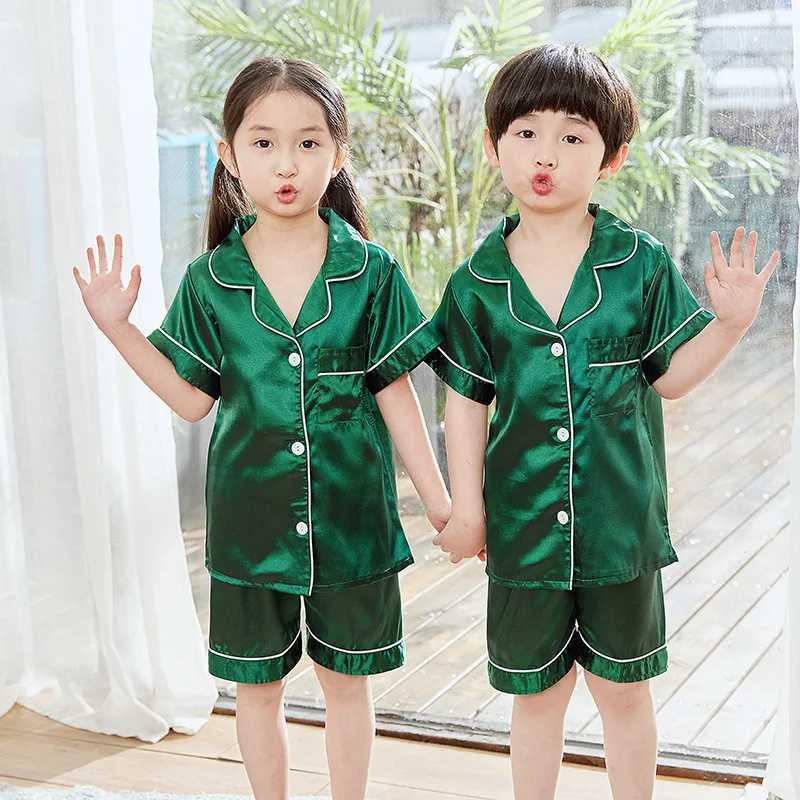 2024 Childrens Pajamas Spring/Summer Short Sleep Shorts Suitable for Boys and Girls Thin Medium and Large Childrens Home Clothing SetsW240716