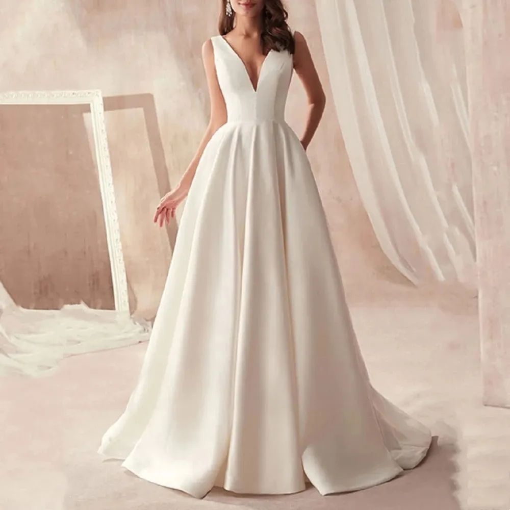 Elegant Ivory Satin A Line Wedding Dresses Deep V Neck Sexy Sleeveless Boho Garden Bridal Gowns Open Back Sweep Train Reeption Dress For Bride Simple 