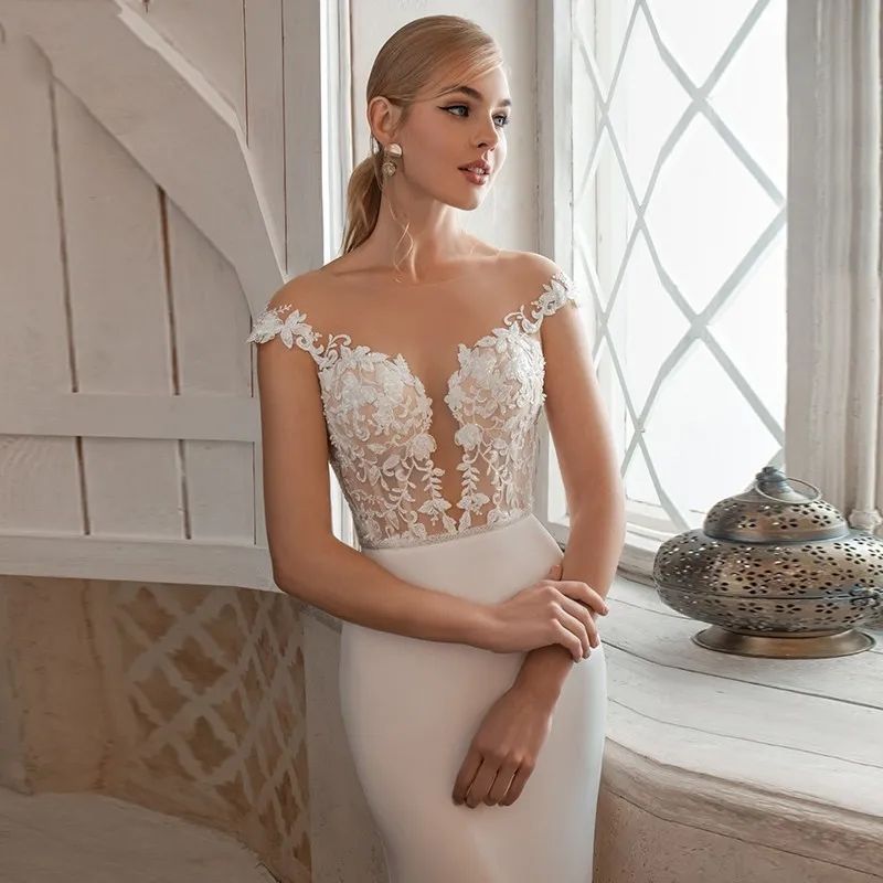 Elegant Mermaid Wedding Dresses 2024 Lace Appliques Cap Sleeves Illusion Buttons Back Boho Bridal Gowns Sweep Train Vestidos De Novia Custom Made