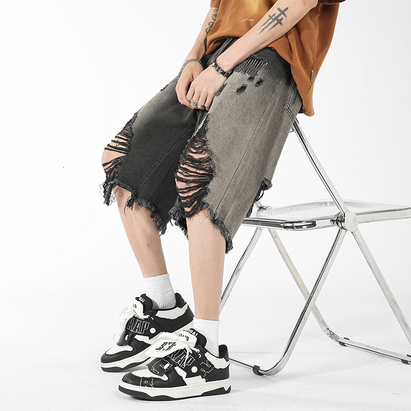 Ripped denim shorts men's summer thin cut fringed loose five quarter American high street horse pants