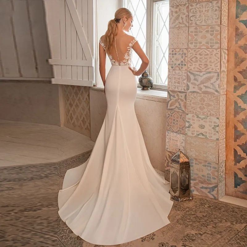 Elegant Mermaid Wedding Dresses 2024 Lace Appliques Cap Sleeves Illusion Buttons Back Boho Bridal Gowns Sweep Train Vestidos De Novia Custom Made