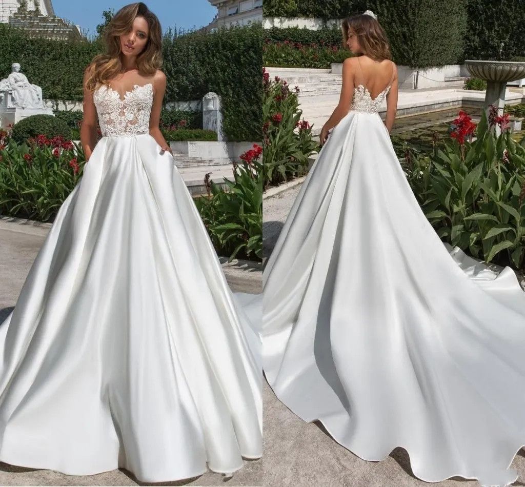 A Line Wedding Dresses For Brides With Pockets Sheer Crew Appliqued Plus Size Simple Bridal Gowns Sweep Train Backless Robes de Mariee Custom Made