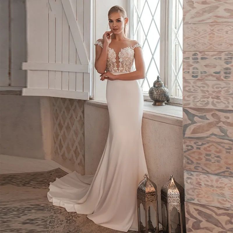 Elegant Mermaid Wedding Dresses 2024 Lace Appliques Cap Sleeves Illusion Buttons Back Boho Bridal Gowns Sweep Train Vestidos De Novia Custom Made