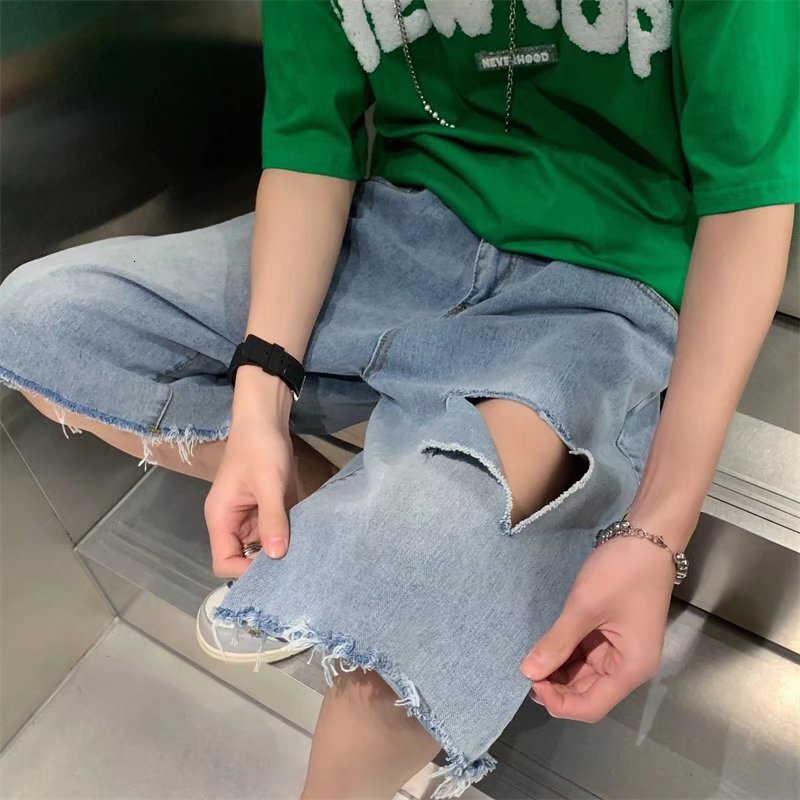 Ripped denim shorts for men and women, summer high street trend, loose straight leg five quarter pants