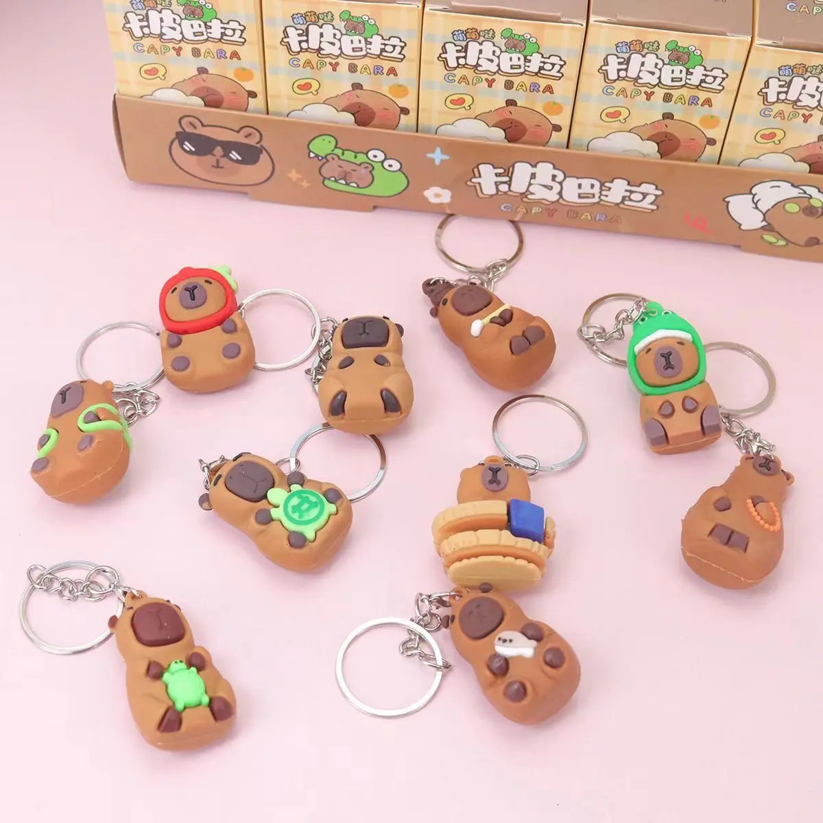 24Pcs/Box Capybara Keychain Kawaii Cartoon Hang On Bag Accessories Anime Figures Keychains birthday gift 240711
