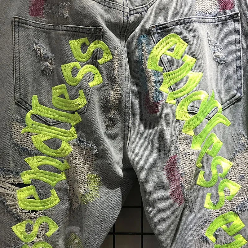 Black fluorescent green letter embroidered pants mens hip-hop damaged hole Distressed high-quality denim jeans 240829