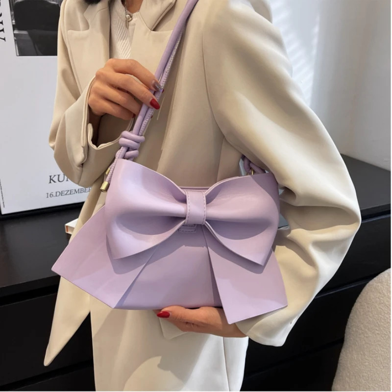 Womens highquality bucket bag Korean version fashion bow single shoulder retro cross body 240723