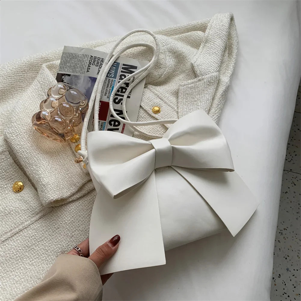 Womens highquality bucket bag Korean version fashion bow single shoulder retro cross body 240723