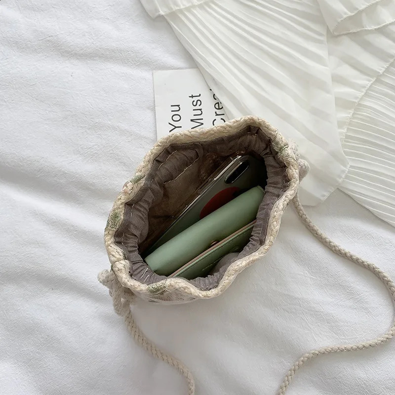 Fashion shoulder bag womens drawstring beach floral embroidery lace horizontal handbag 240723Zl