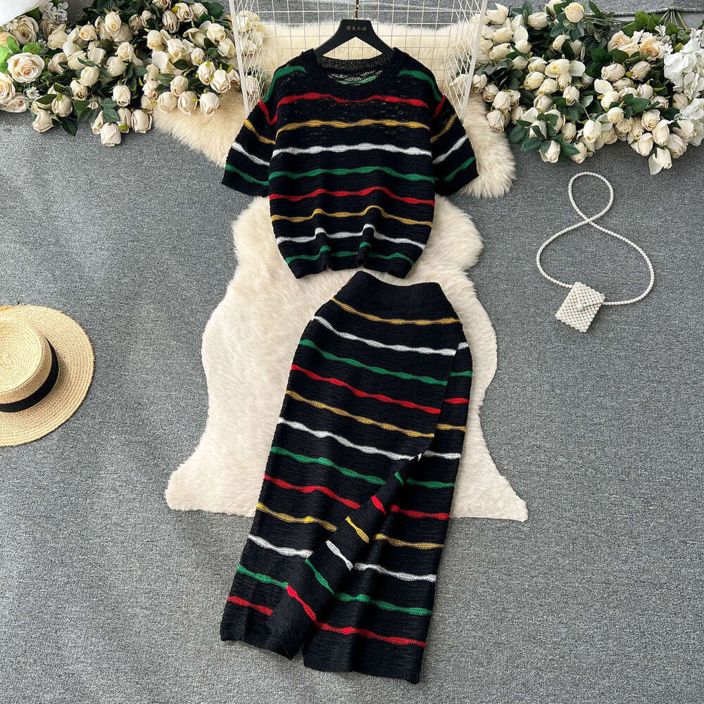 Korean Chic Striped Contrasting Suit for Women with Loose Round Neck Short Sleeved Knitted Top, High Waisted and Buttocks Wrapped Skirt Bifurcated Sil