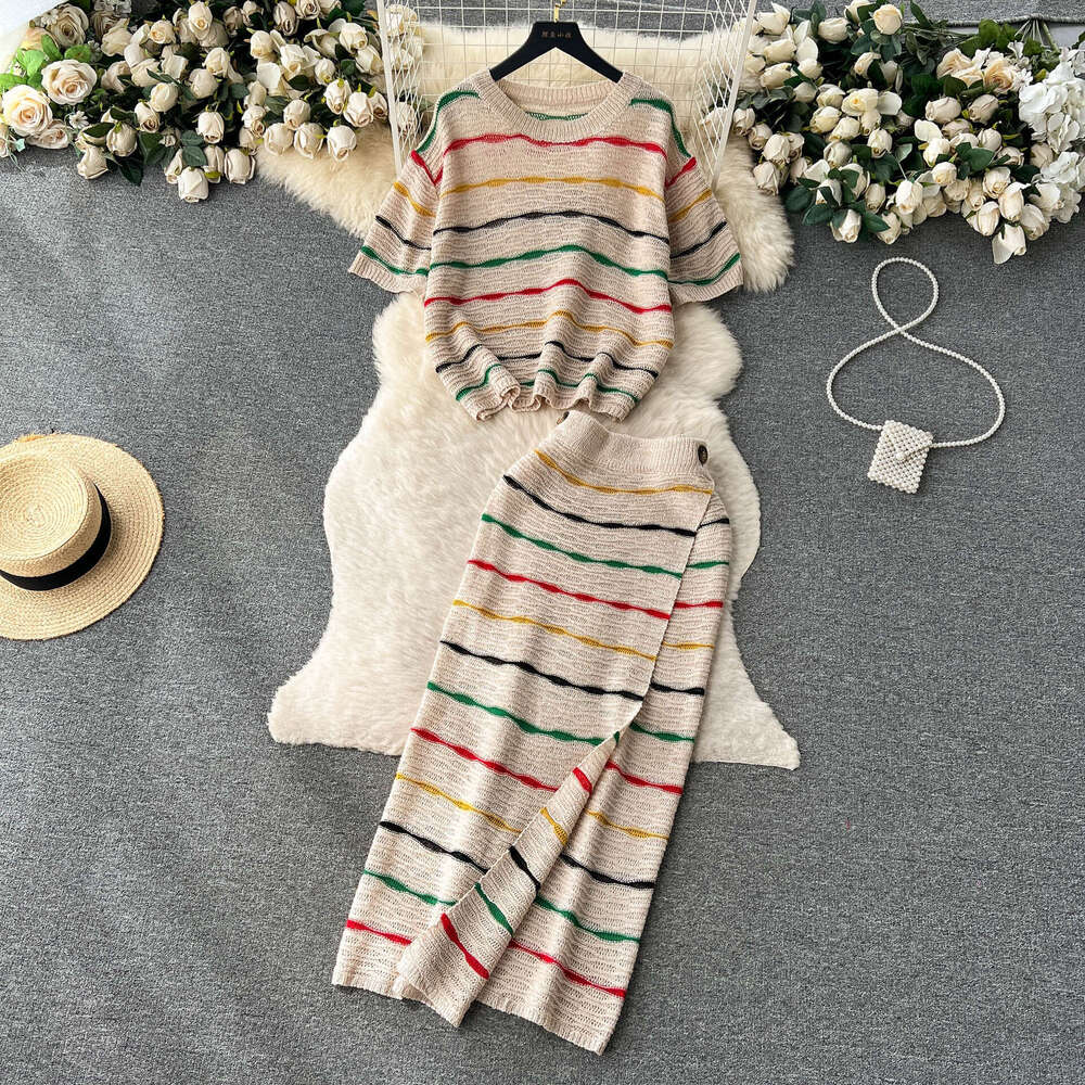 Korean Chic Striped Contrasting Suit for Women with Loose Round Neck Short Sleeved Knitted Top, High Waisted and Buttocks Wrapped Skirt Bifurcated Sil