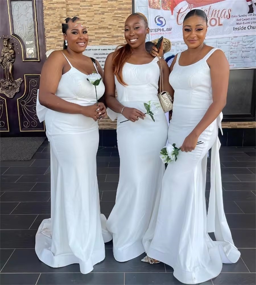2025 White Country Memaid Bridesmaid Dresses Spaghetti Straps Soft Satin Maid Of Honor African Wedding Guest Dress With Bow Backless