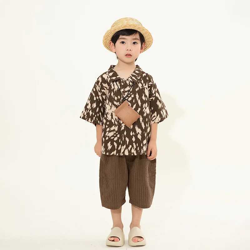 Childrens clothing boys short sleeved shirt summer 2024 Korean retro floral shirt casual simple childrens cotton shirtW240729