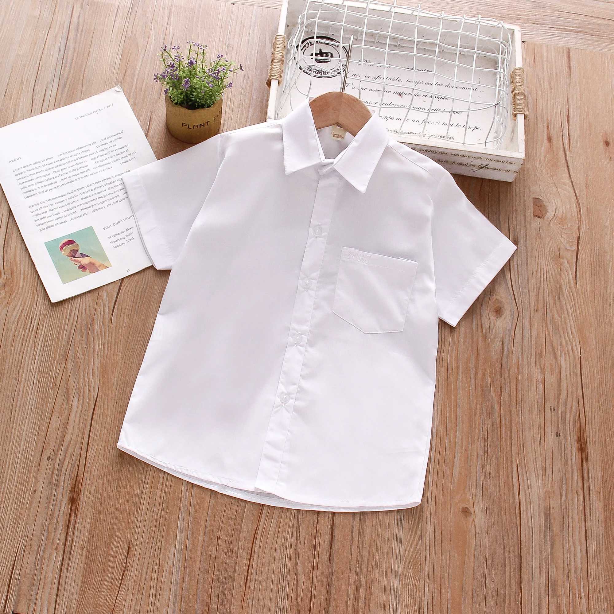 Flip collar pocket design baby shirt summer new boy baby short sleeved solid color boy childrens clothingW240729