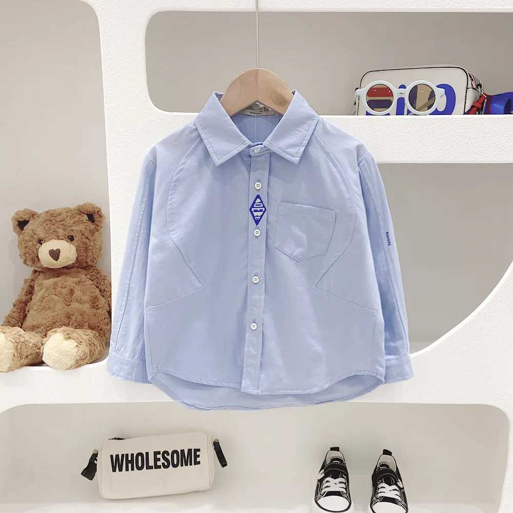 New spring and autumn childrens shirt single chest collar solid student boy blue sticker childrens boy cardiganW240729