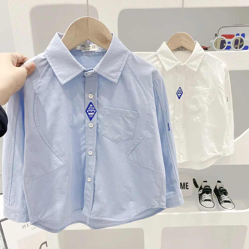 New spring and autumn childrens shirt single chest collar solid student boy blue sticker childrens boy cardiganW240729