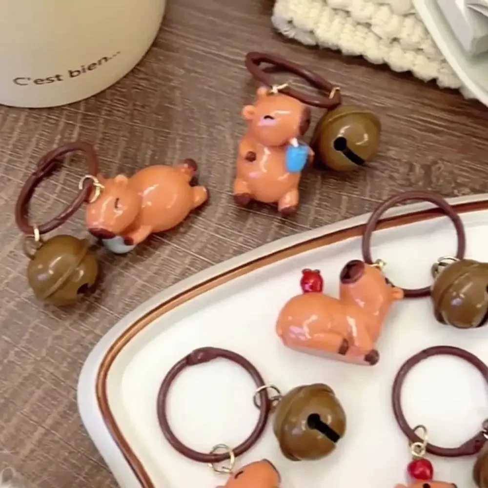Lovely Cartoon Resin Capybara Keychain Creative Charms Small Bell Capybara Bag Pendant Kapibala Keyring GiftsL240729