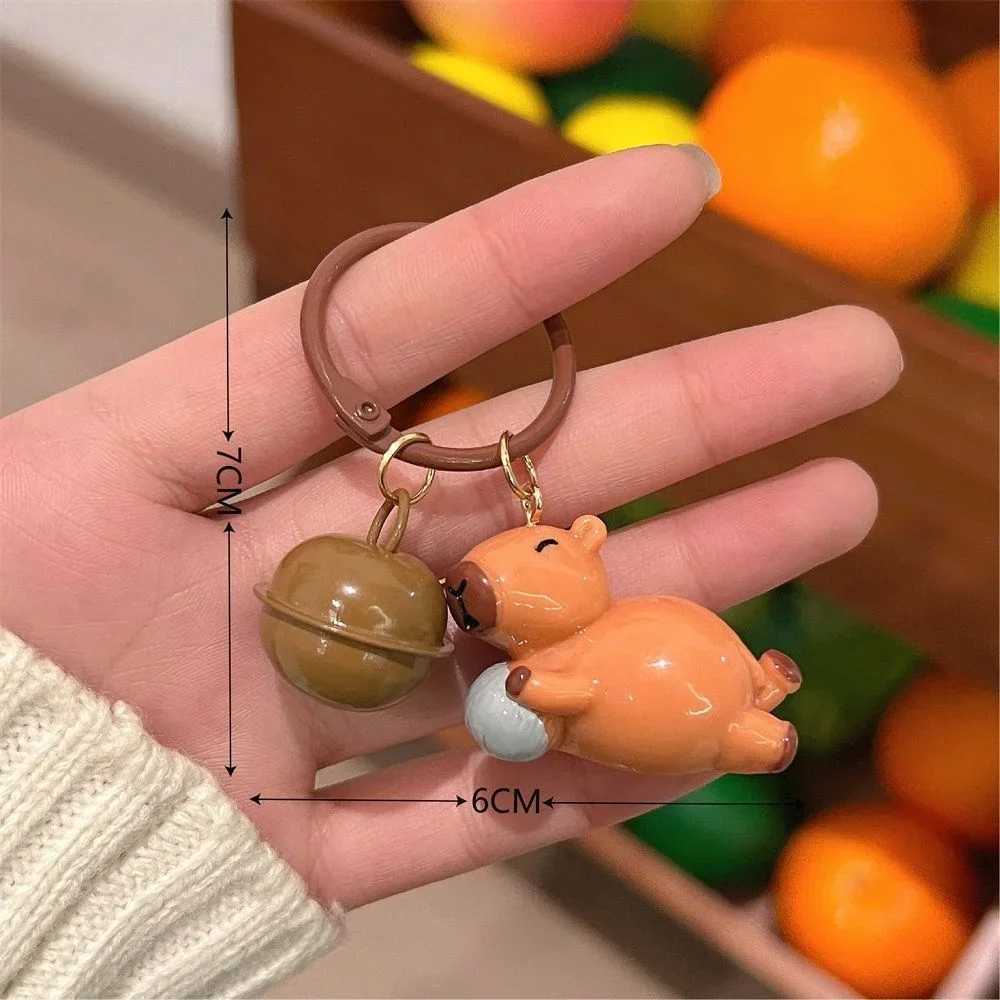 Lovely Cartoon Resin Capybara Keychain Creative Charms Small Bell Capybara Bag Pendant Kapibala Keyring GiftsL240729