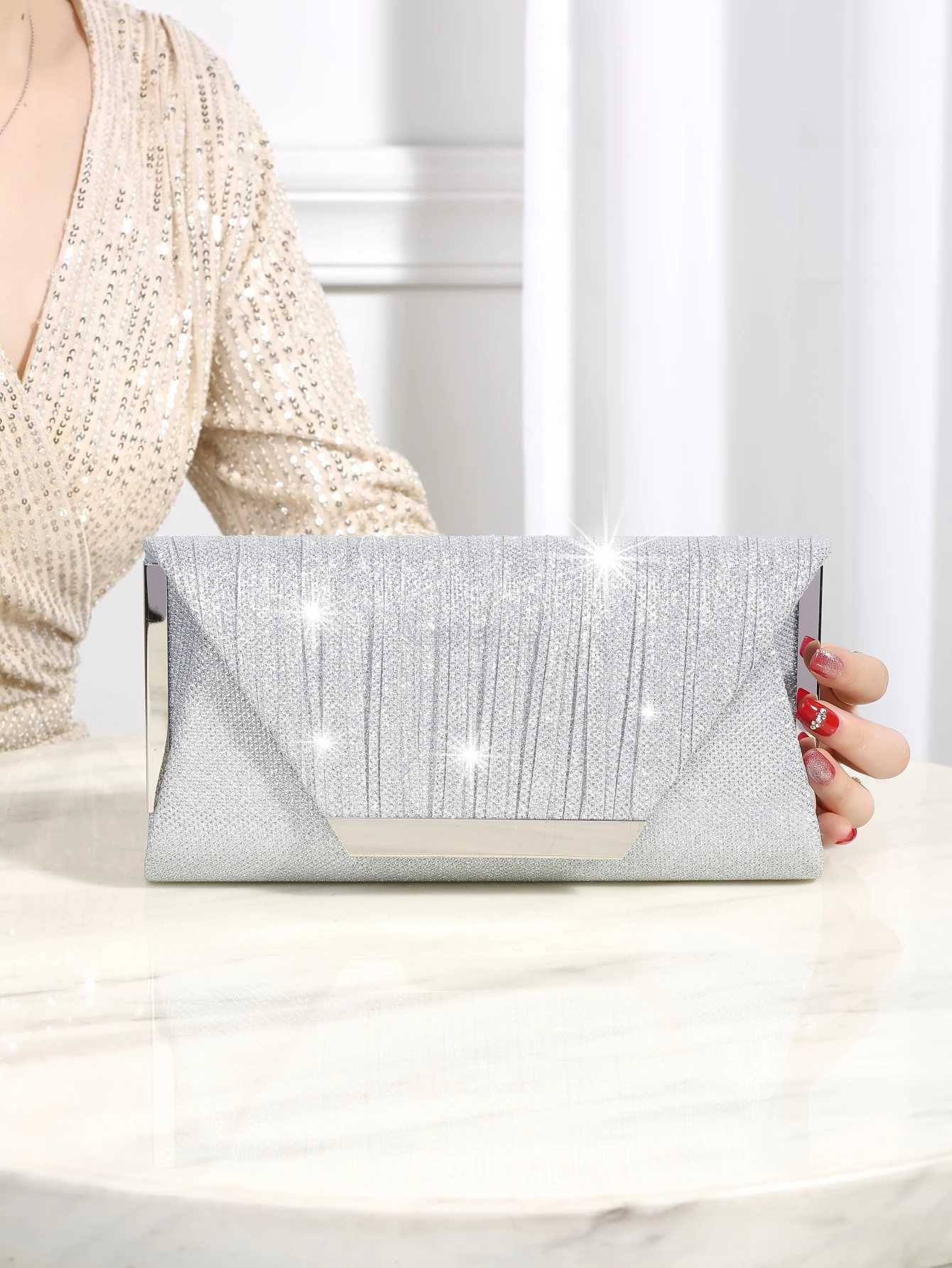 Luxurious shiny metallic patchwork envelope clutch with magnetic snap fastener elegant and stylish evening bagXJ240729