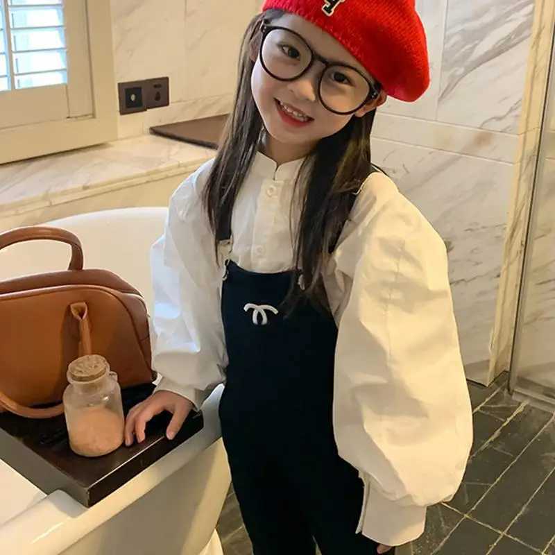 2024 Spring/Autumn Clothing Childrens Girls Solid Puff Sleeve Shirt Childrens Cotton Loose Fashion Top Baby Casual Full Match ShirtW240729