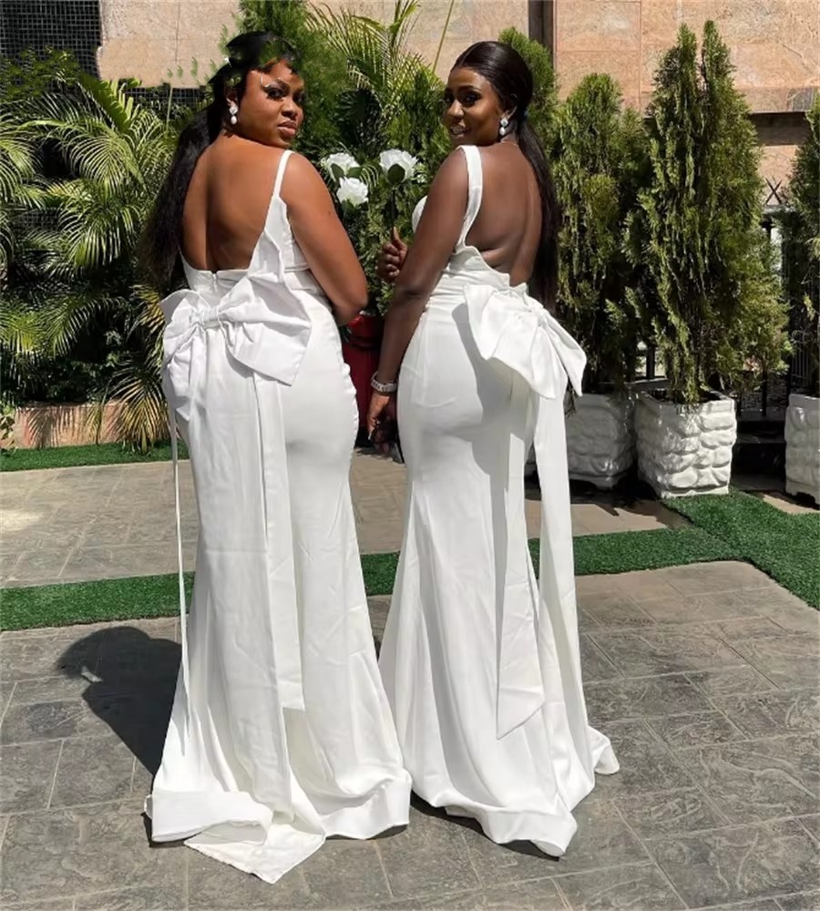 2025 White Country Memaid Bridesmaid Dresses Spaghetti Straps Soft Satin Maid Of Honor African Wedding Guest Dress With Bow Backless