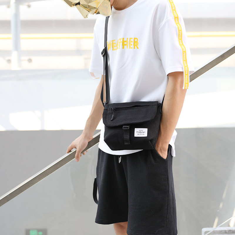 Crossbody bag men's fashion brand single shoulder bag canvas boys crossbody bag mobile phone bag backpack men a piece of hair