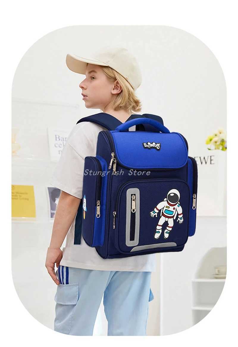 New Boys Orthopedic School Bags Child Astronaut Printing Backpacks Primary Student Girls Childrens Schoolbag Waterproof KidCL240730