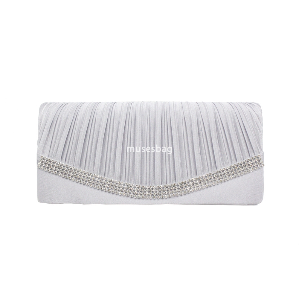 The factory directly supplies explosive European style silk rhinestones fashion ladies hand bag dinner bag a piece of hair