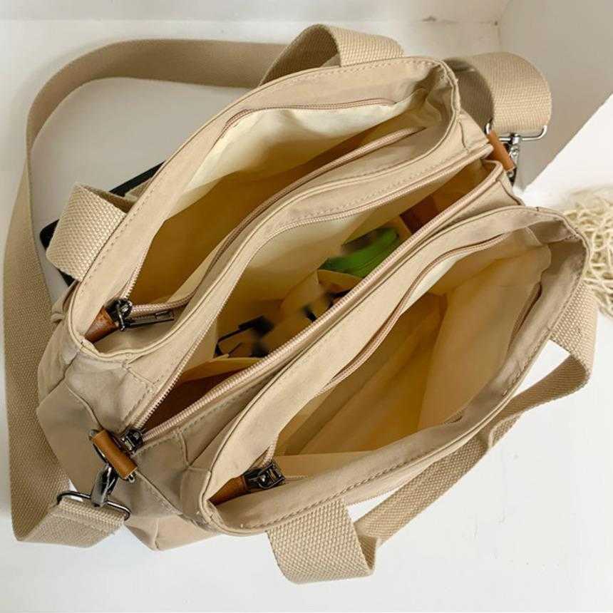 Shoulder Bags Fashion Leisure WoMens Bag WoMens Portable One Shoulder Messenger Bag WoMens Commuting Large Capacity Multi Compartment Bag 241015