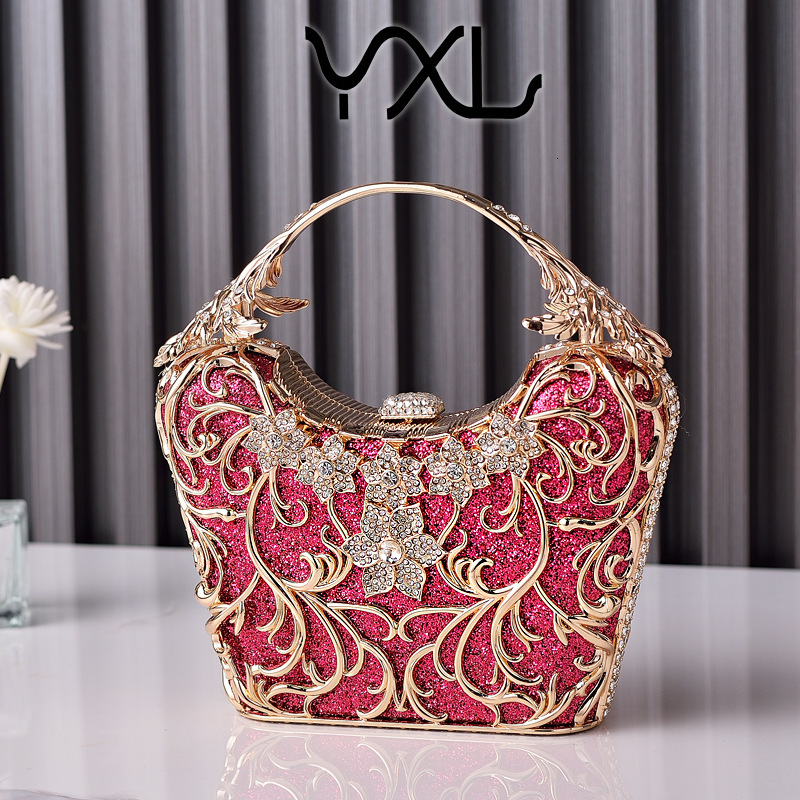 New black luxury hollowed out design paired with opponent's handheld shiny banquet bag