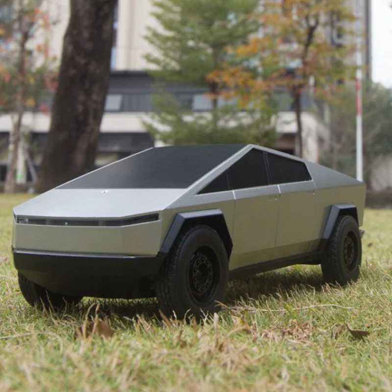 Rechargeable toy car remote control four-way remote control car Tesla anti fall network pickup boy toy gift X241101