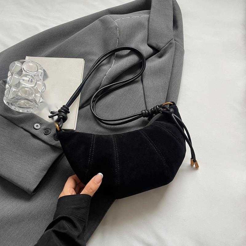 CMM Korean Niche Cow Horn Dumpling Bag Womens Bag New Texture Frosted Crossbody Bag Daily Commuting Phone Bag